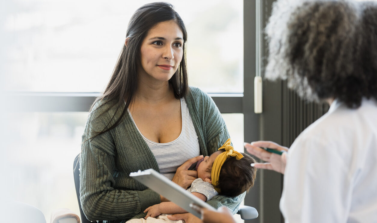 Mother and Baby Consultation with Doctor at Clinic
