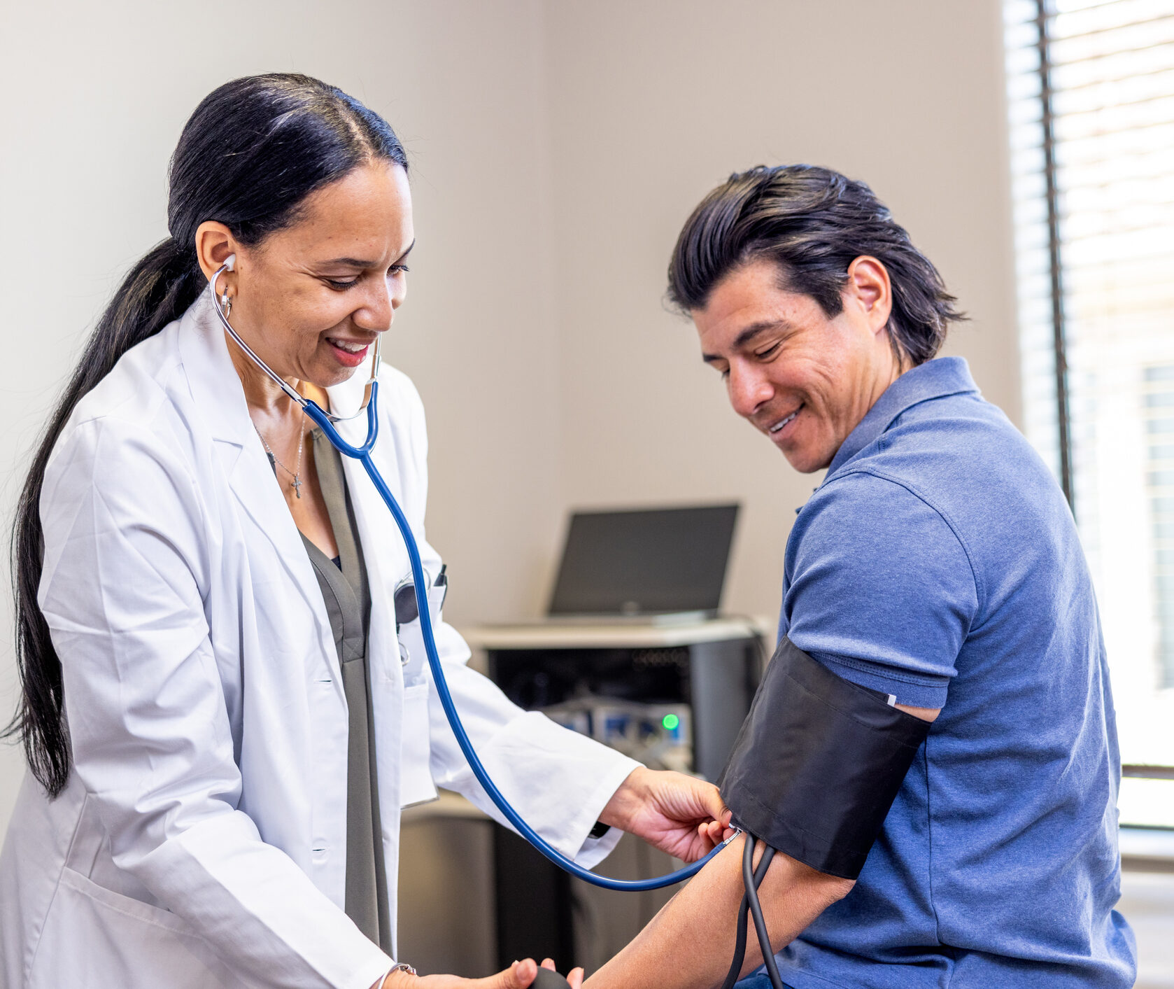 A hispanic male in his early 40s at a doctors appointment