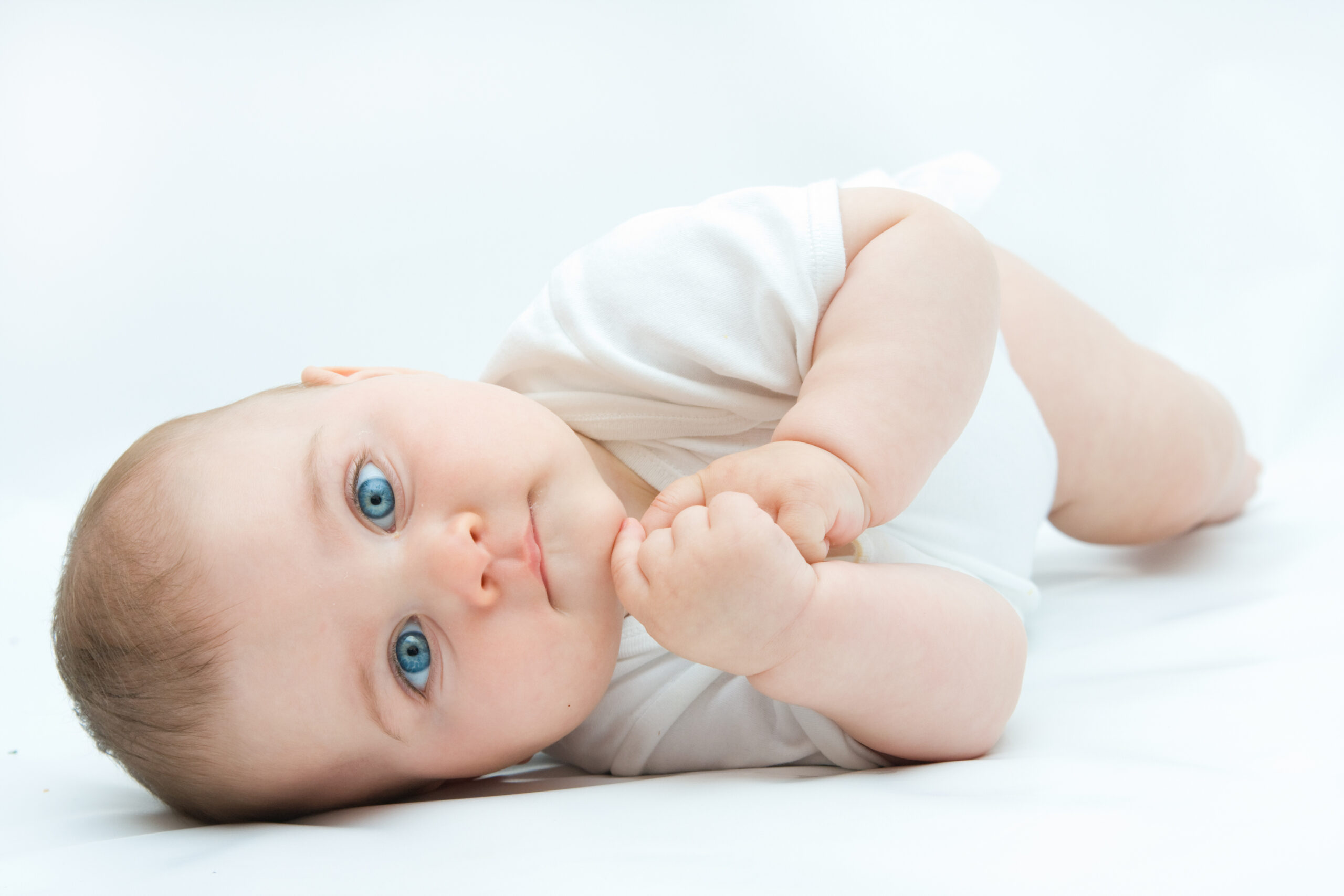 cute newborn baby boy with blue eyes
