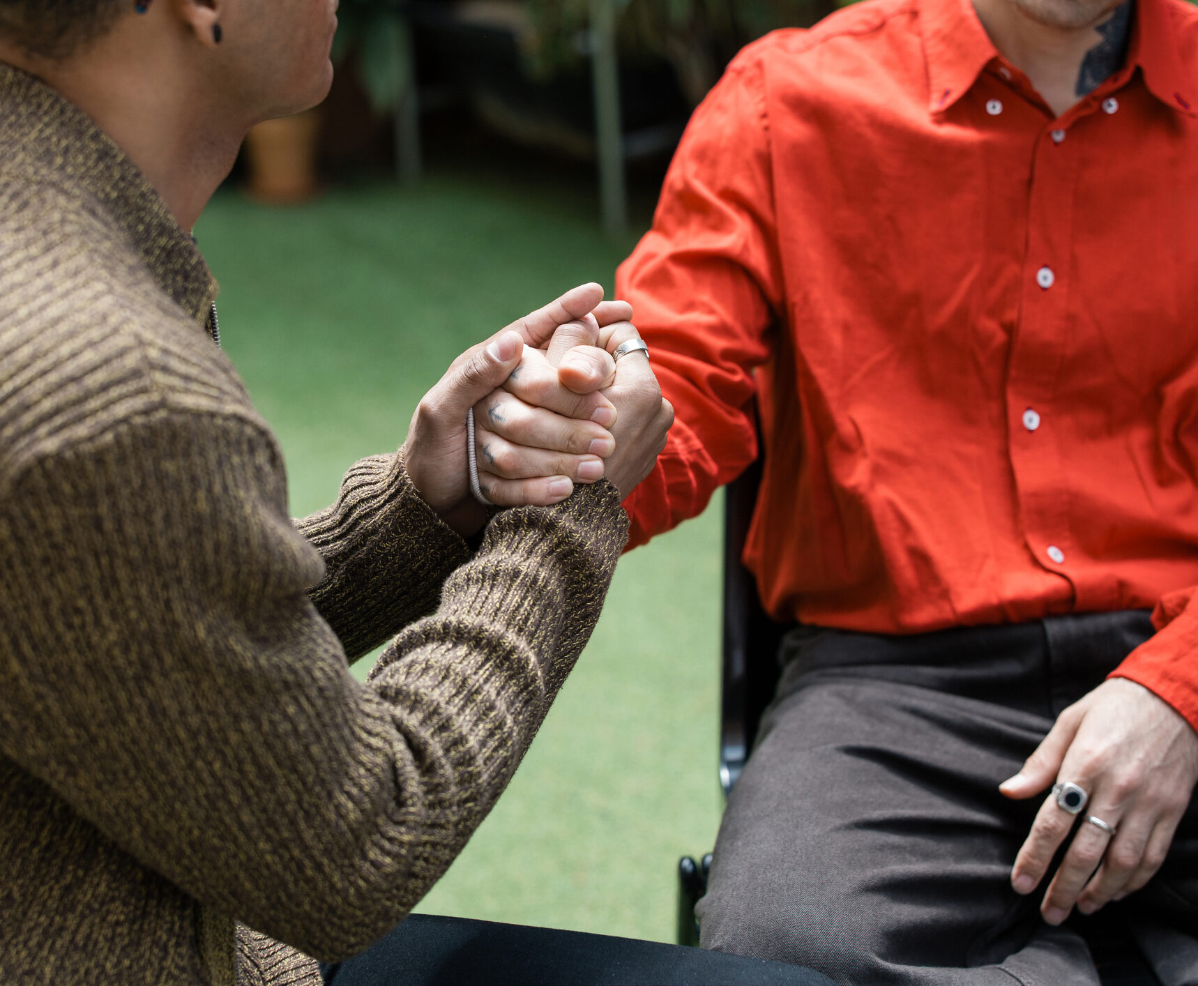 People offering emotional support and empathy during a group therapy session, connecting and showing solidarity while healing